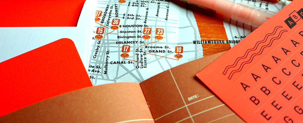 A selection of orange stationery